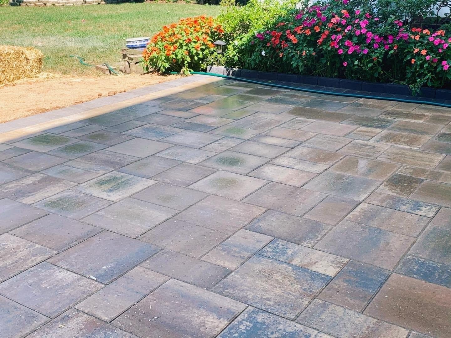 Large paver patio with seating walls