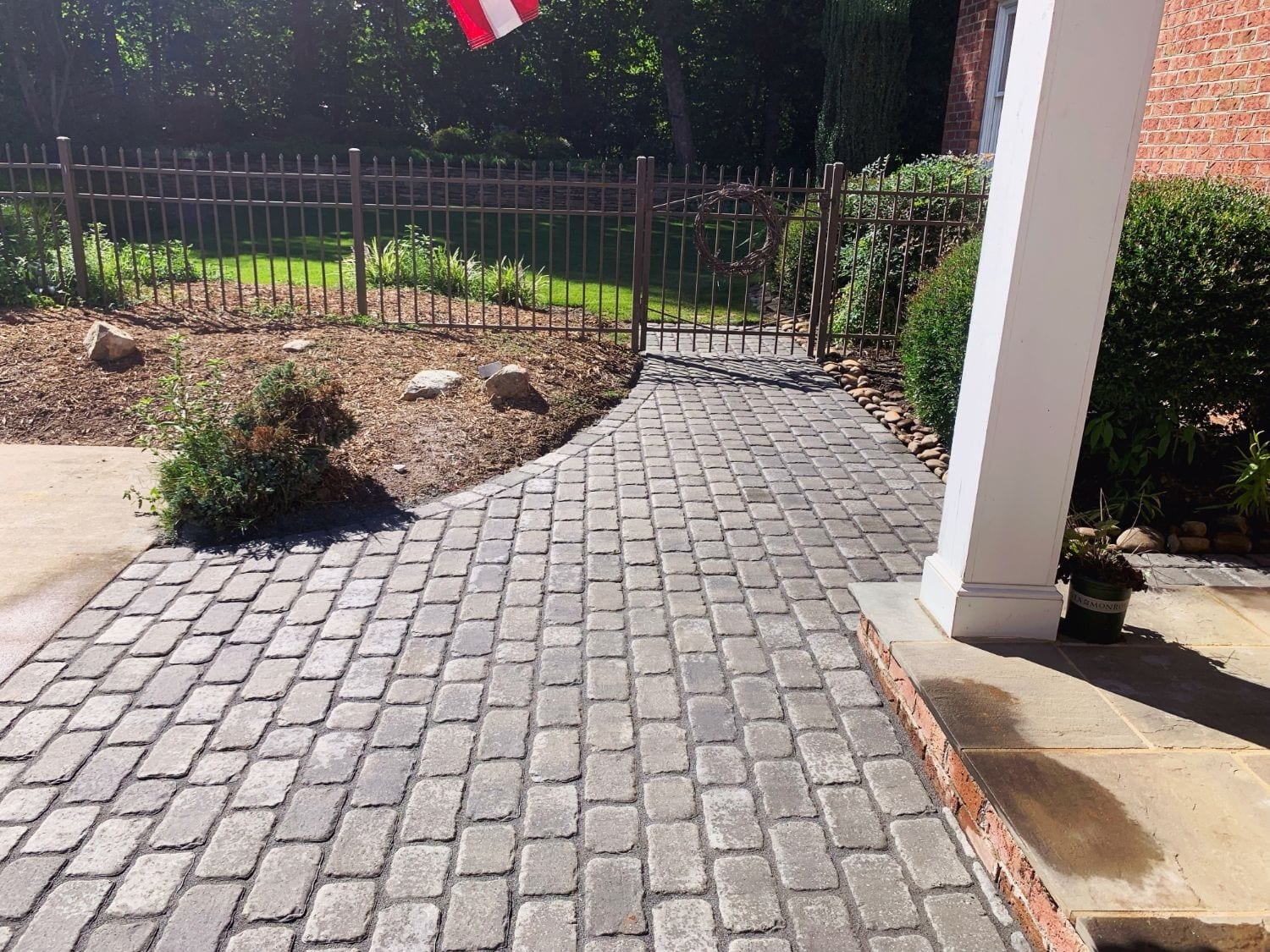 Cobble-style paver walkway to the front porch